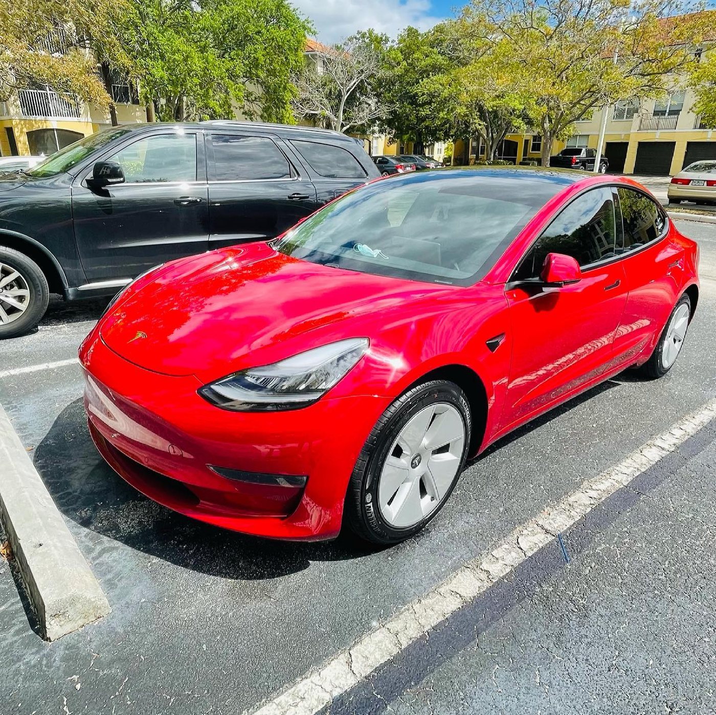 Tesla Model 3 - Red (Aero Wheels) protected at Elite Premium Detailing