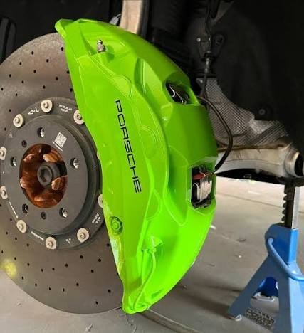 Porsche caliper freshly painted acid green
